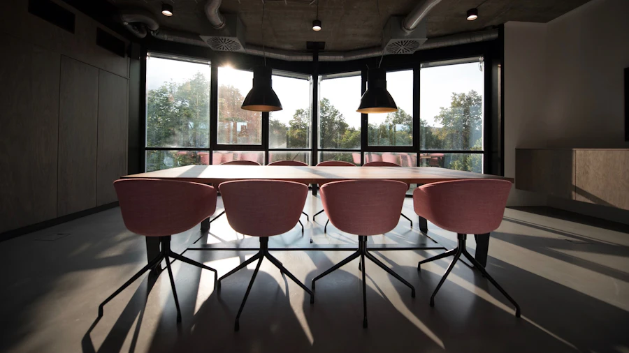 Boardroom table beneath pendant lighting