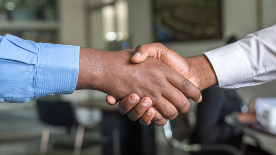 Handshake closing an agreement